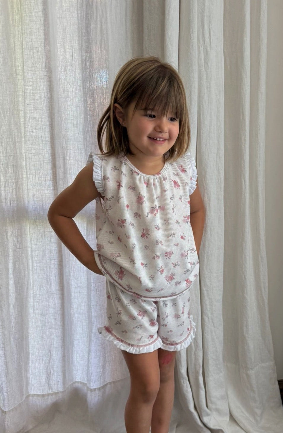 Pijama corto nido floreado rosa de niña